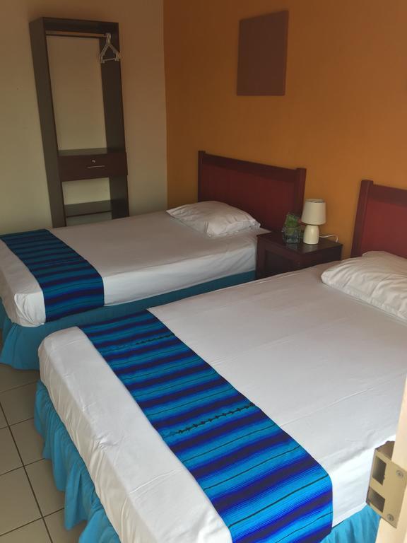 Hotel Villa Margarita Flores Habitación foto
