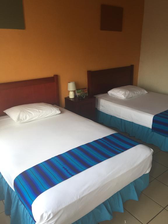 Hotel Villa Margarita Flores Habitación foto