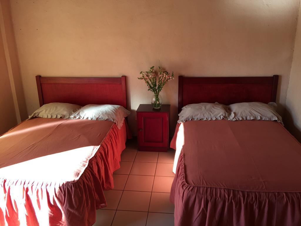 Hotel Villa Margarita Flores Habitación foto